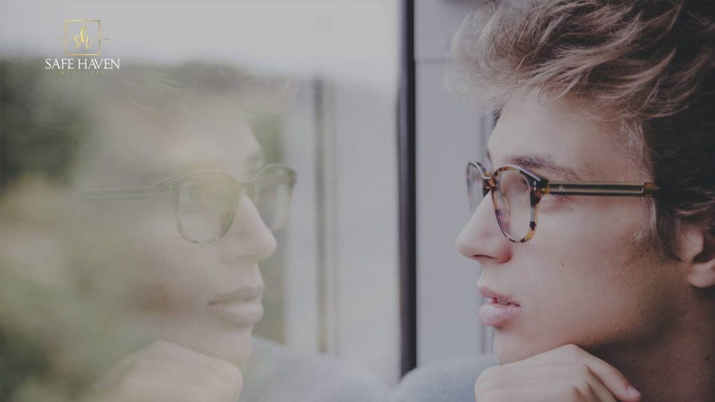 The Mental Health Perspective on Addressing the Stigma that Surrounds Addiction 1 Man looking at a window