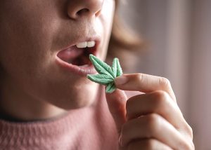 Woman eating edible marijuana