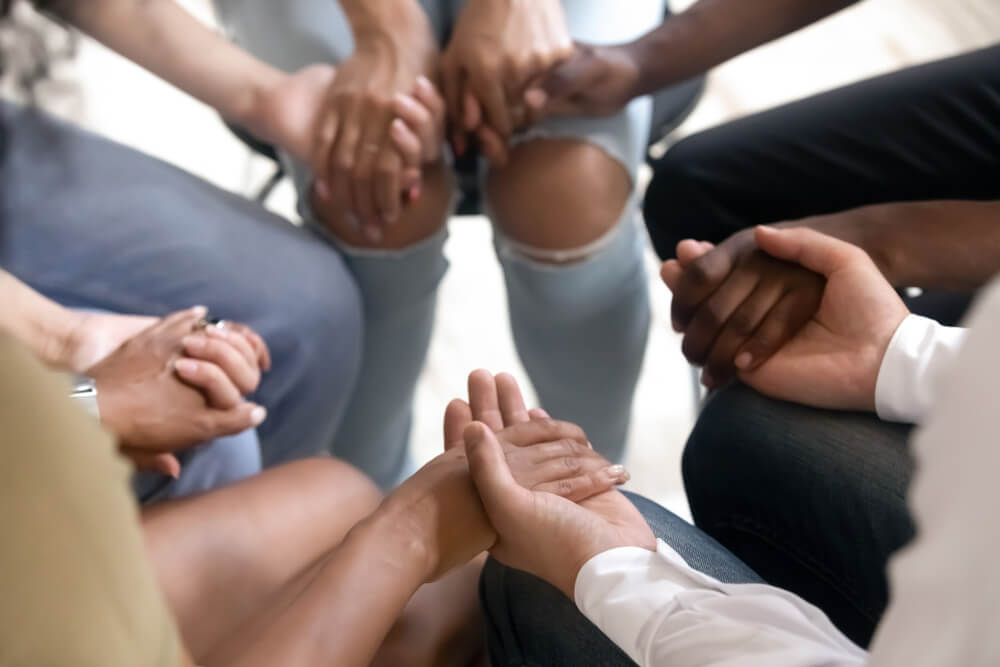 Luxury Sober Living Los Angeles 1 Group on individuals holding hands together