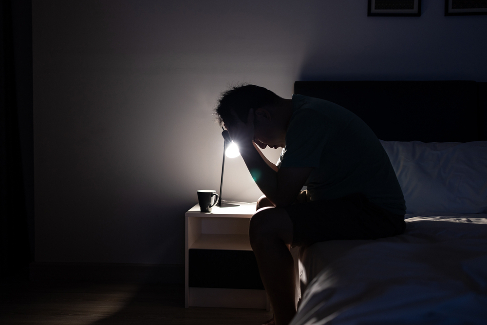 Signs of a Cocaine Addict 1 Troubled man in the dark