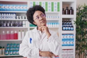 Pharmacist thinking about medication