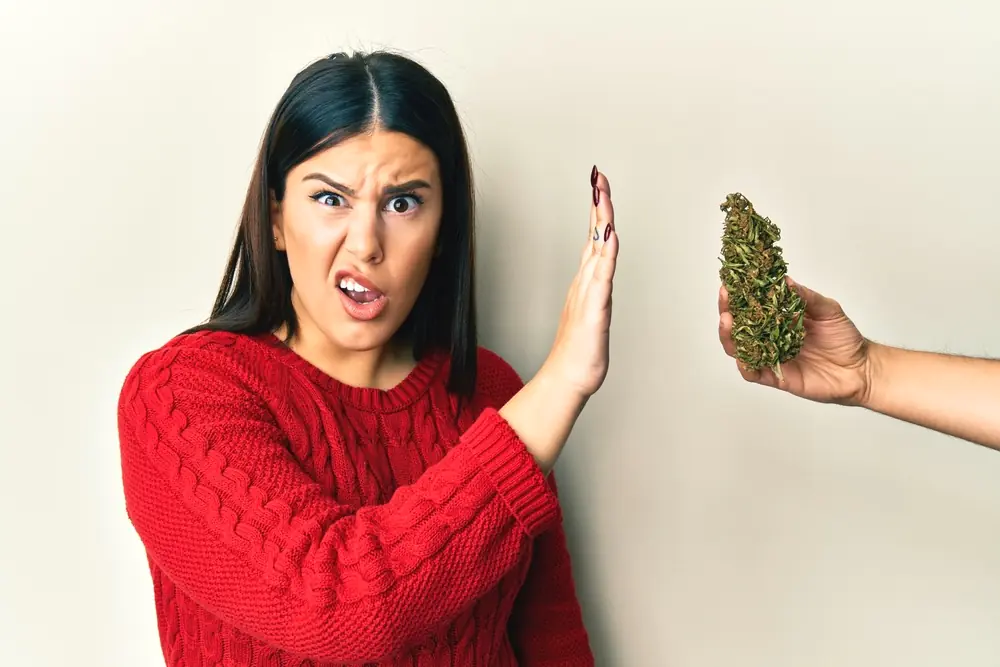 woman refusing weed