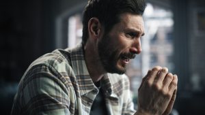 An emotional man with mental health problems