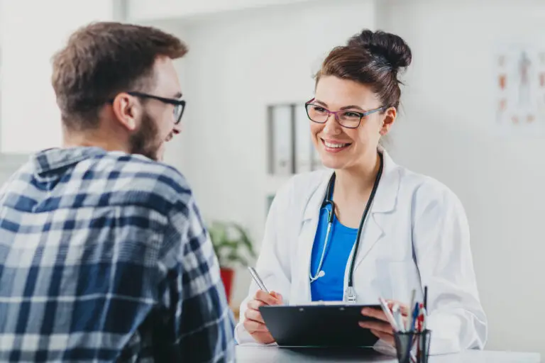 doctor talks to patient about addiction and mental health.