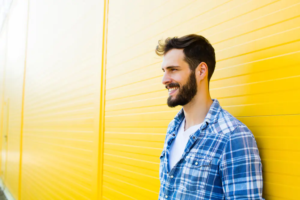young man yellow background
